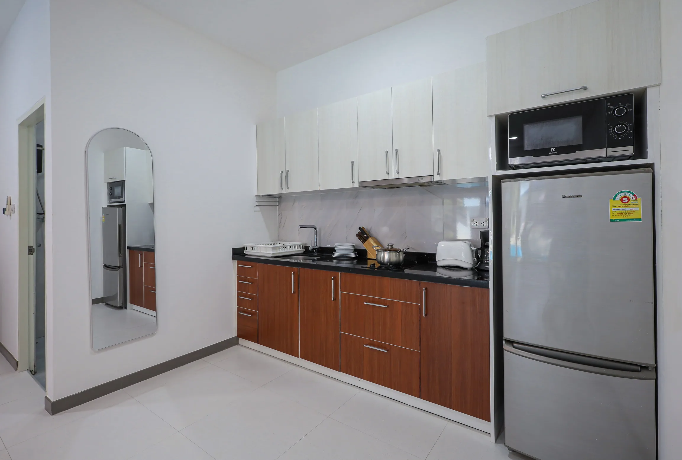 Kitchenette detail in the poolside studio apartment