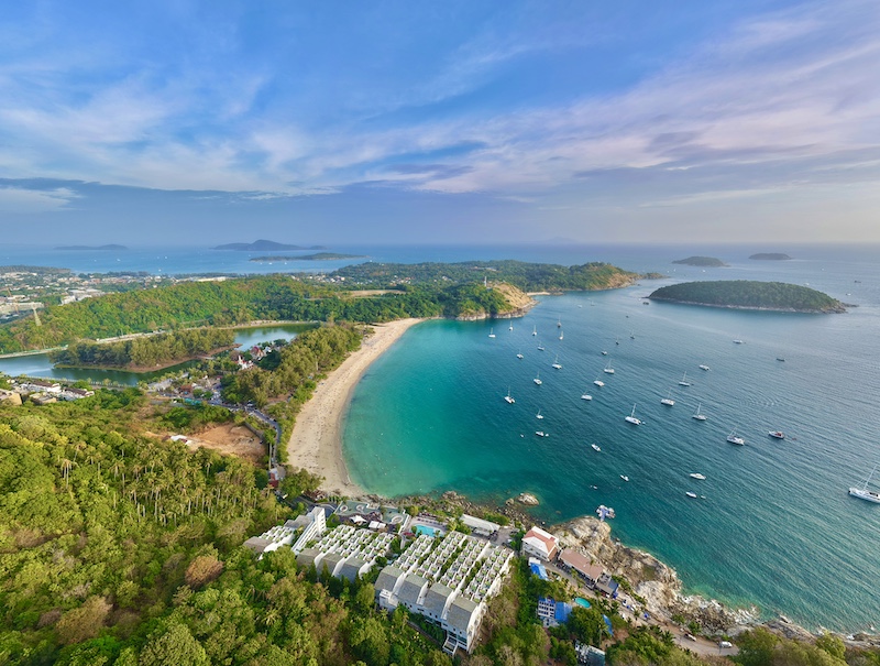 Nai Harn Beach in Phuket, a stunning white-sand beach near Yanui Breeze Apartments.