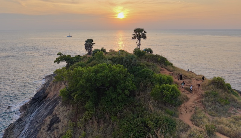 Panoramic view from Windmill Viewpoint in Phuket, overlooking Nai Harn and Yanui Beach.