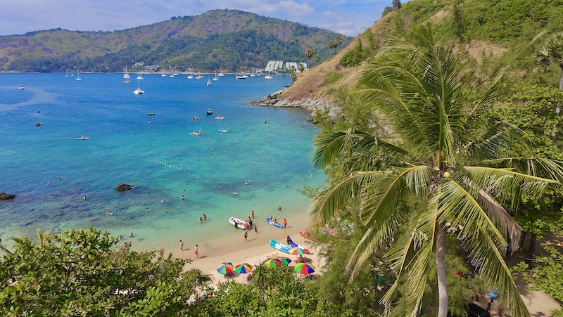 Aerial view of Yanui Beach in Phuket, Thailand, with turquoise waters and golden sand.